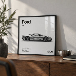 American Supercar Wall Art, a small A4 framed print leaning on a walnut sideboard in a living room