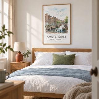 Amsterdam Canal Art Print, framed on the wall of a restful main bedroom for a travel-loving couple in a UK flat with a soft white wall and natural timber furniture
