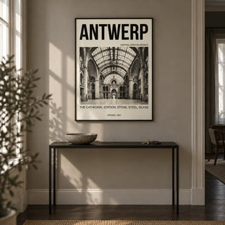 Antwerp Central Station Art Print, framed on the wall of a period hallway with a warm grey wall and a plain dark wood floor