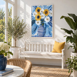 Art of Sunflowers, framed on the wall of a bright conservatory with plain white walls and real potted plants