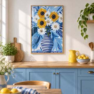 Art of Sunflowers, framed on the wall of a bright kitchen with plain sky blue units and an oak worktop