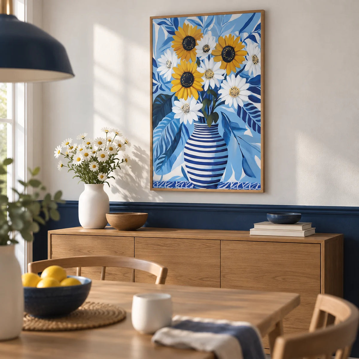 Art of Sunflowers, framed on the wall of a dining room with a plain navy lower wall and white upper wall