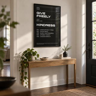 Art with Quote, framed on the wall of a welcoming entrance hall by the front door with a white wall and a dark wood floor