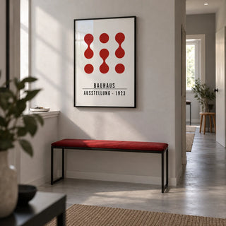 Artwork for Office Walls, framed on the wall of a bright entrance hallway in a design-conscious UK flat with a pale grey wall and plain concrete-effect flooring