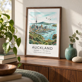 Auckland City Art Print, a small A4 framed print leaning on a walnut sideboard in a living room