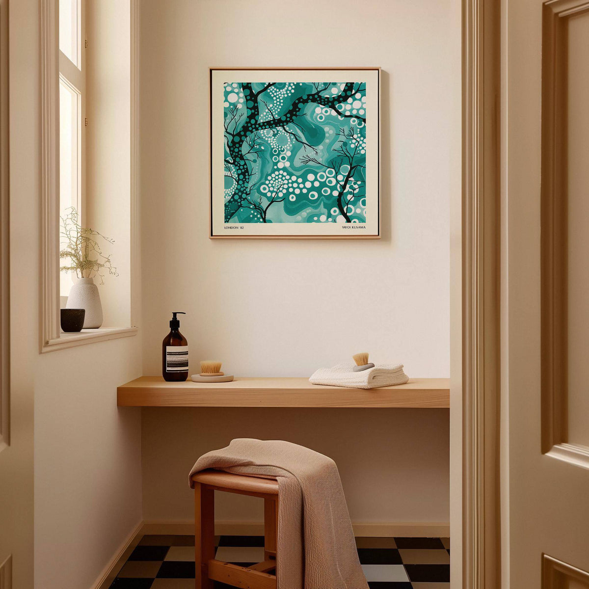Teal Abstract wall art with abstract tree branches in teal and black hanging above a wooden console table