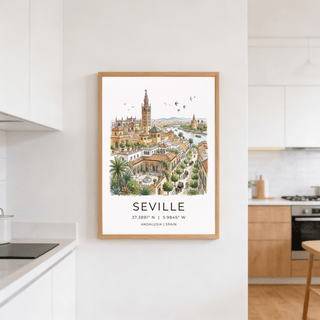Seville art print with a watercolour cityscape illustration framed on a kitchen wall near wooden cabinets