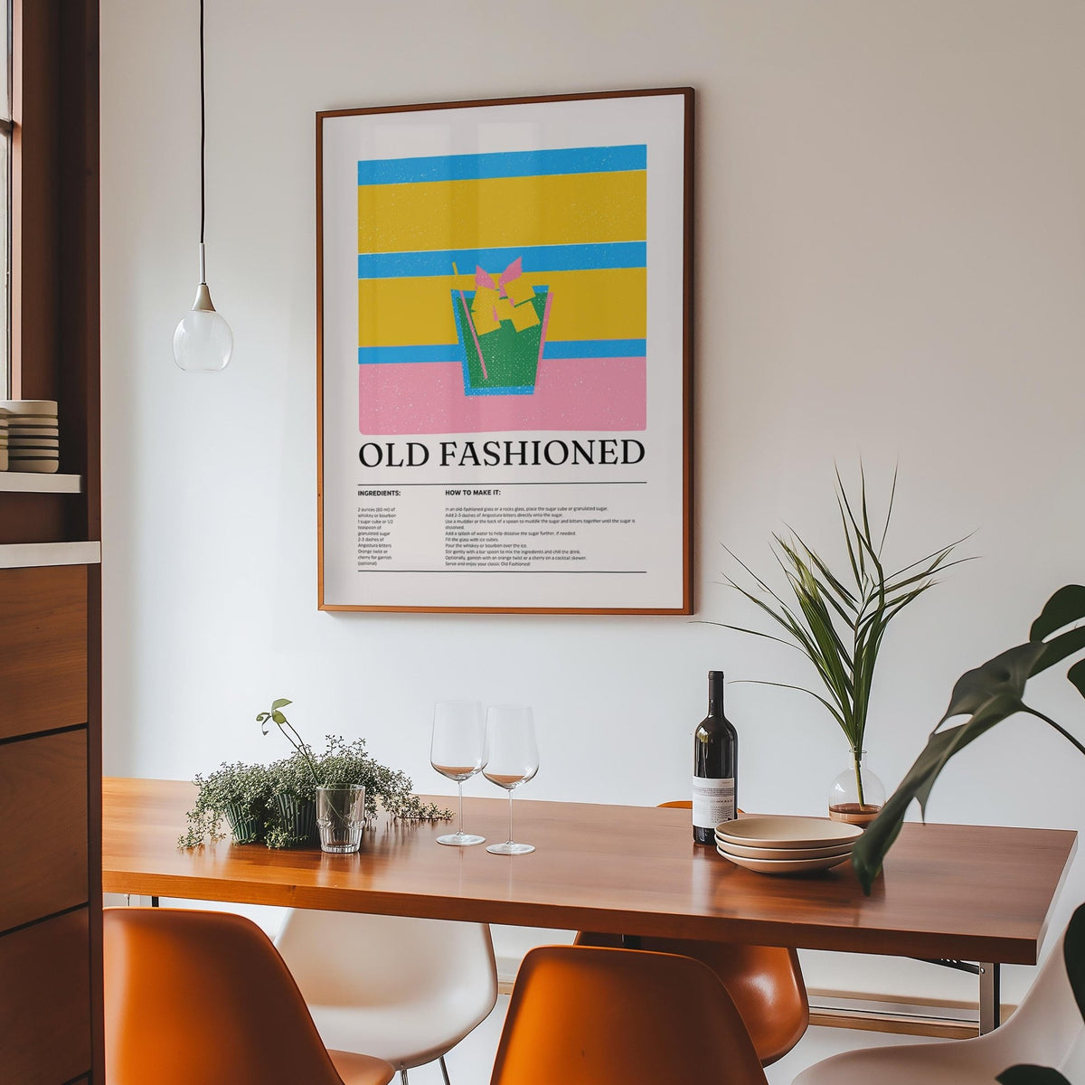 Drink wall art for kitchen showing old fashioned cocktail illustration in yellow blue and pink above a dining table
