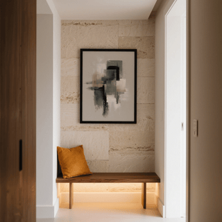 Neutral Wabi Sabi wall art with abstract blocks in green and beige above a wooden bench with an orange cushion