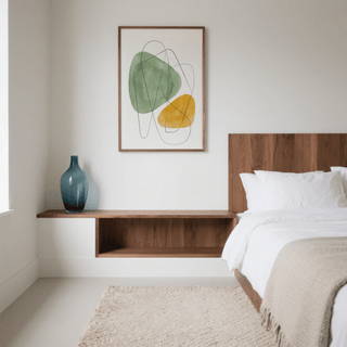 Abstract Watercolor Art framed on a wall above shelf with a blue vase in a bedroom