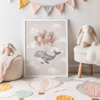 Print of a whale with balloons in soft watercolour pastels leaning on the floor in a children's room with toys