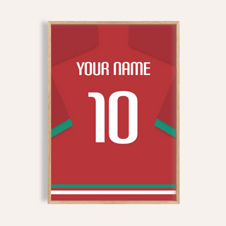 Framed print close-up of football shirt poster in red with green sleeve stripe and white number 10