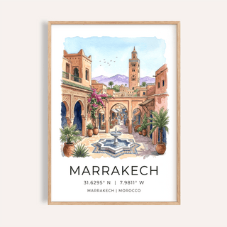 Framed Marrakech Landscape Wall Art of a watercolour Marrakech street scene with a central fountain and blue sky