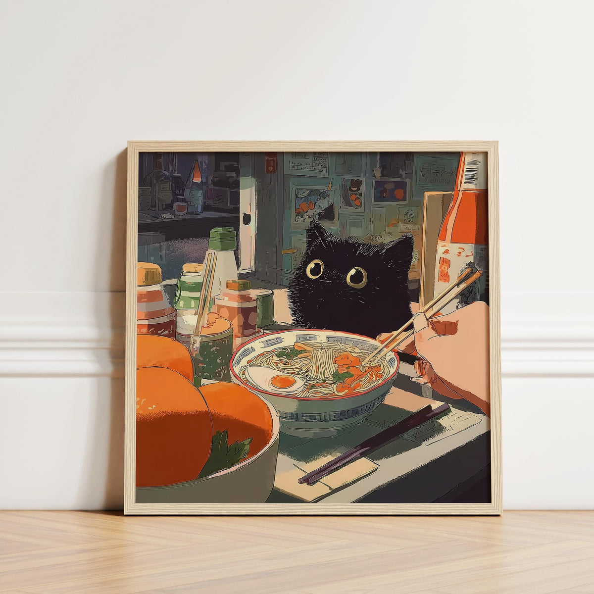 Framed Ramen wall art with a black cat and bowl of noodles in warm tones leaning on the floor