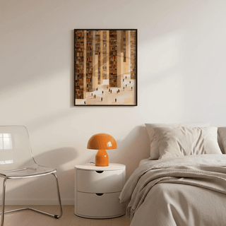 Framed Library Art Print of endless stacks in warm browns and beiges hanging above a bed with a bedside table and orange lamp