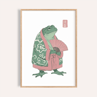 Framed print of a frog dressed in traditional Japanese robes holding a pink fan on a plain background