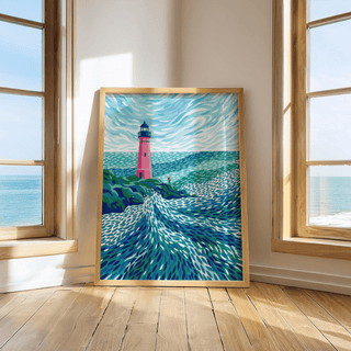 Print leaning on a floor of Modern Lighthouse Art showing a pink lighthouse with blue sea and sky between two windows