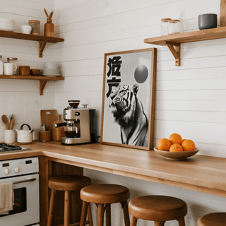 Black And White Tiger Print leaning on kitchen counter near coffee machine and bowl of oranges