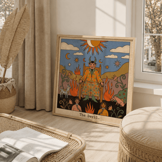 Print leaning on the floor of Tarot Card Devil Art in folk style with muted colours and natural light