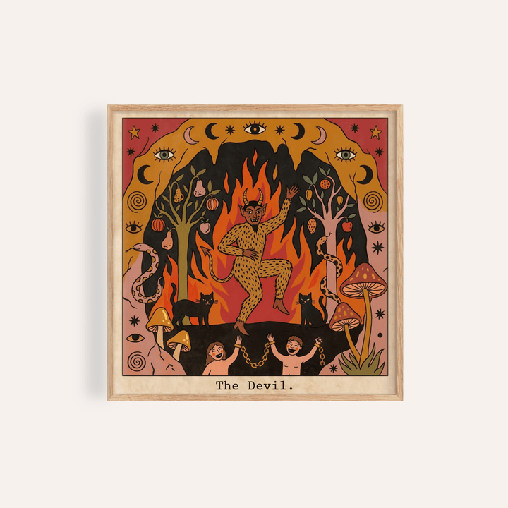 Framed print close-up of The Devil Tarot Card Art with a dancing devil in red orange and black tones