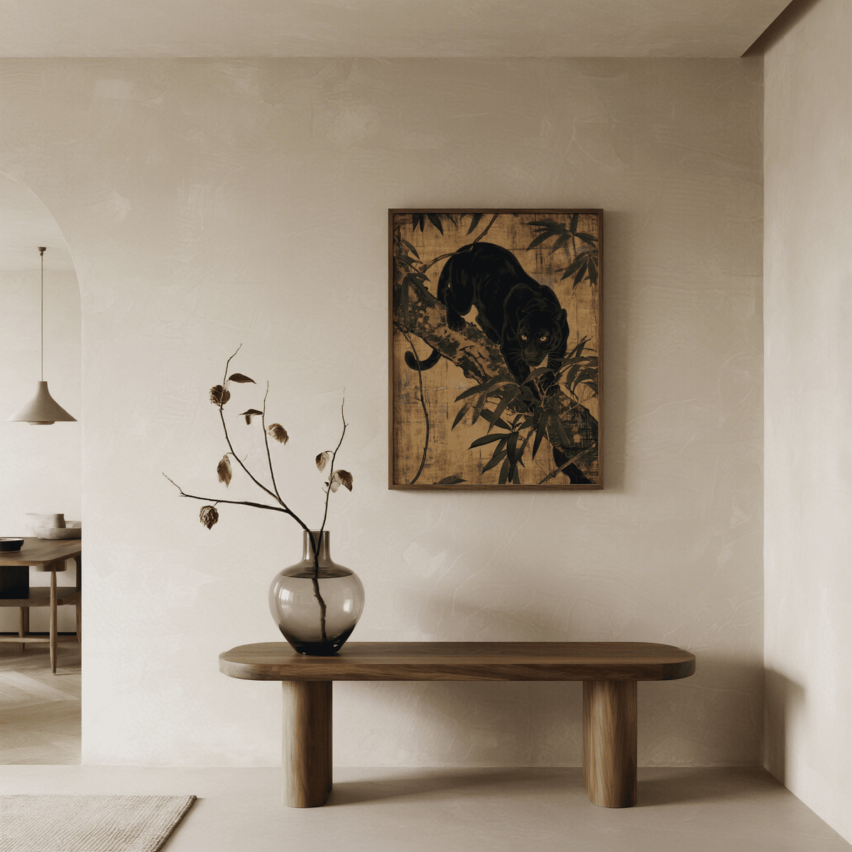 Jungle wall art of a black panther in Japanese ink style hanging above a wooden table with a vase