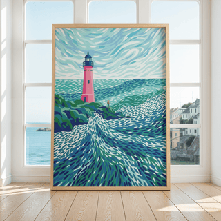 Modern Lighthouse Art print leaning on the floor by large windows showing a coastal view