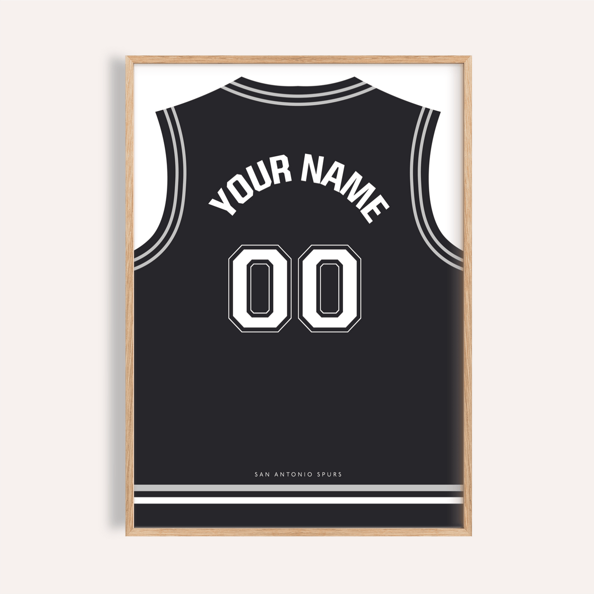 Framed Basketball Jersey Poster in Black with White Number with minimalist typography in a light wooden frame