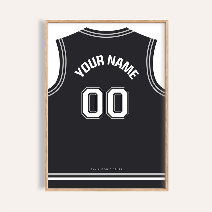 Framed Basketball Jersey Poster in Black with White Number with minimalist typography in a light wooden frame