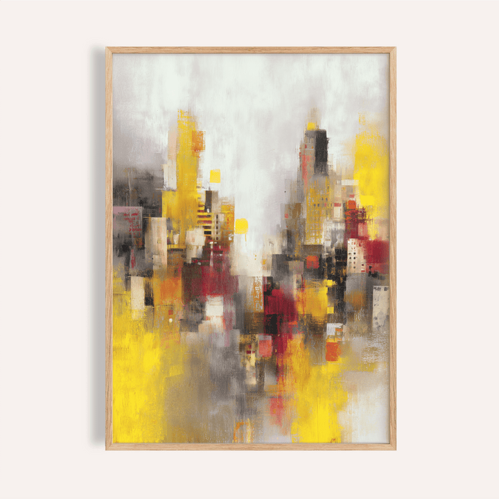 Framed abstract cityscape art print with yellow red and grey tones on a plain background
