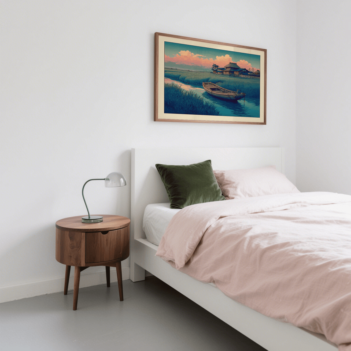 Hasui Kawase River Boat print on a bedroom wall above a bed with pink linens