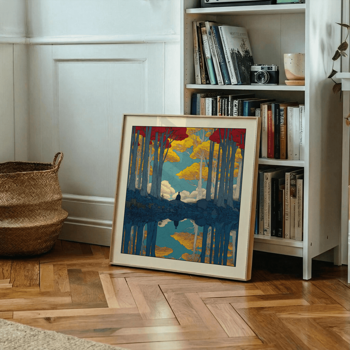 Print leaning on a floor of Hasui Kawase Serene Nature wall art with blue and yellow hues near a bookcase