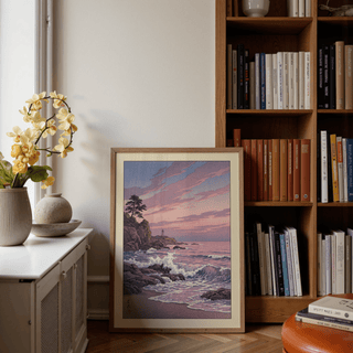 Lighthouse Sunset wall art with pink and purple waves leaning near a wooden bookshelf with books and a plant