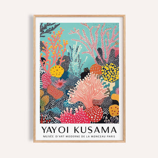 Bright wall art showing abstract coral reef with coral pinks and yellows in wooden frame