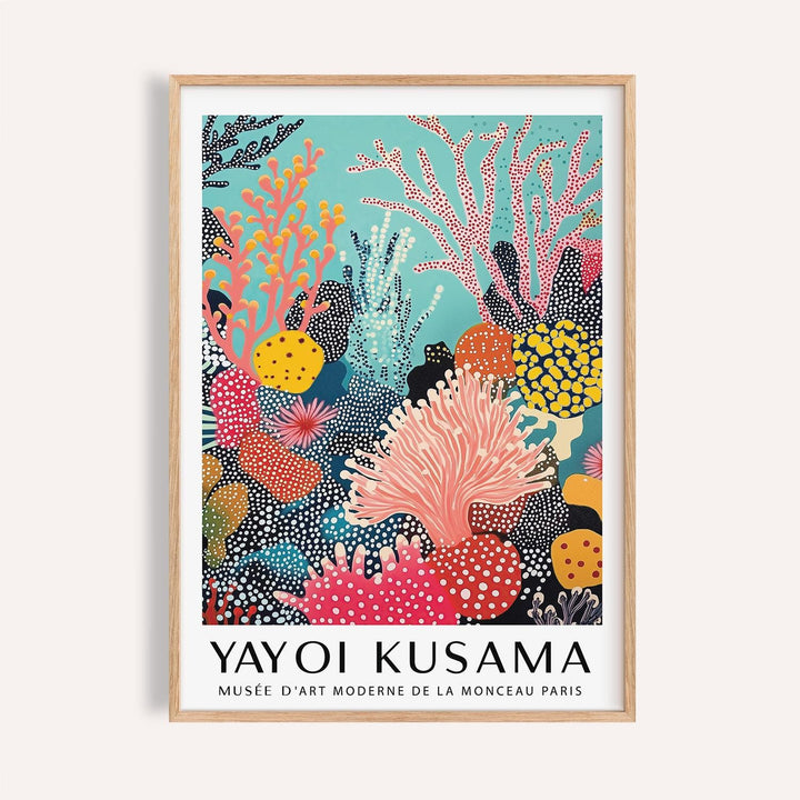 Bright wall art showing abstract coral reef with coral pinks and yellows in wooden frame