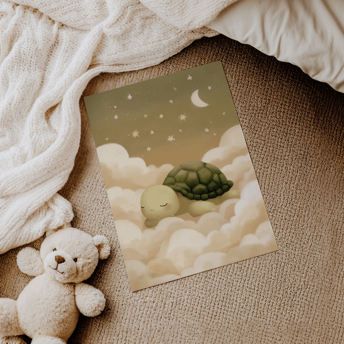 Turtle wall art of a sleeping turtle on clouds with stars and moon lying on a carpet beside a teddy bear