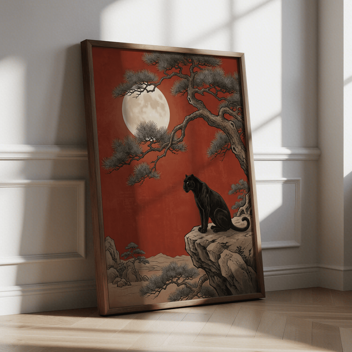 Framed Black Panther Moon Print leaning on a floor against a sunlit white wall