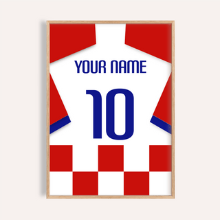 Framed close-up of football shirt poster in red and white checks with blue number 10 and text