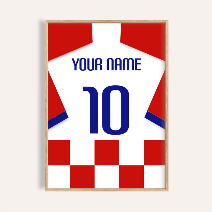 Framed close-up of football shirt poster in red and white checks with blue number 10 and text