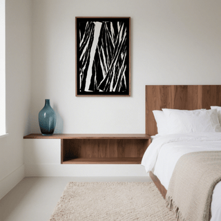 Art Black White Abstract framed print with black and white lines above a wooden shelf with a blue vase in a bedroom