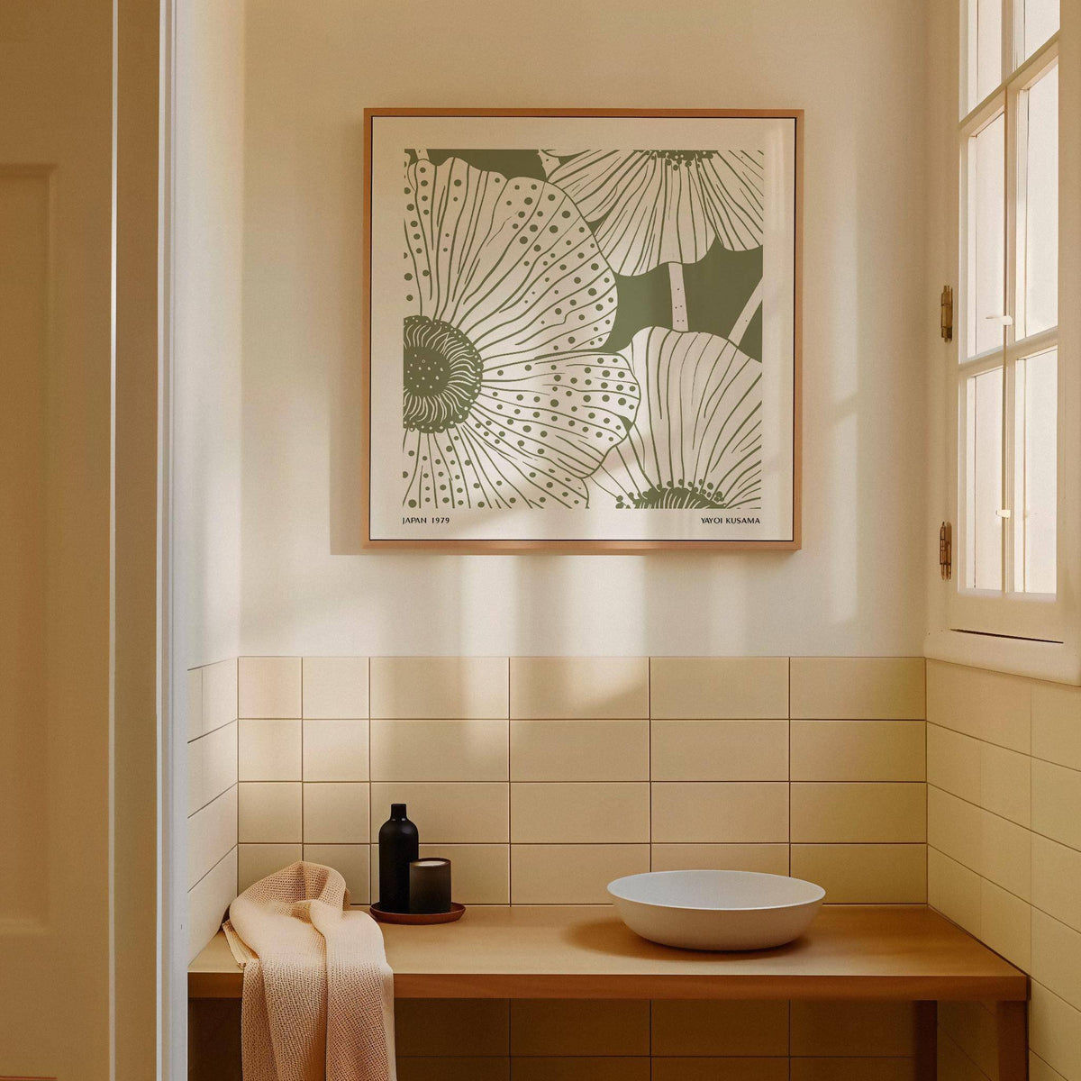 Sage Green Abstract Wall Art of white stylised poppies in a wooden frame above a sink with a beige towel