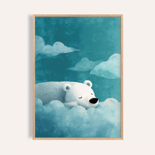 Framed polar bear wall art of a sleeping bear among soft blue clouds