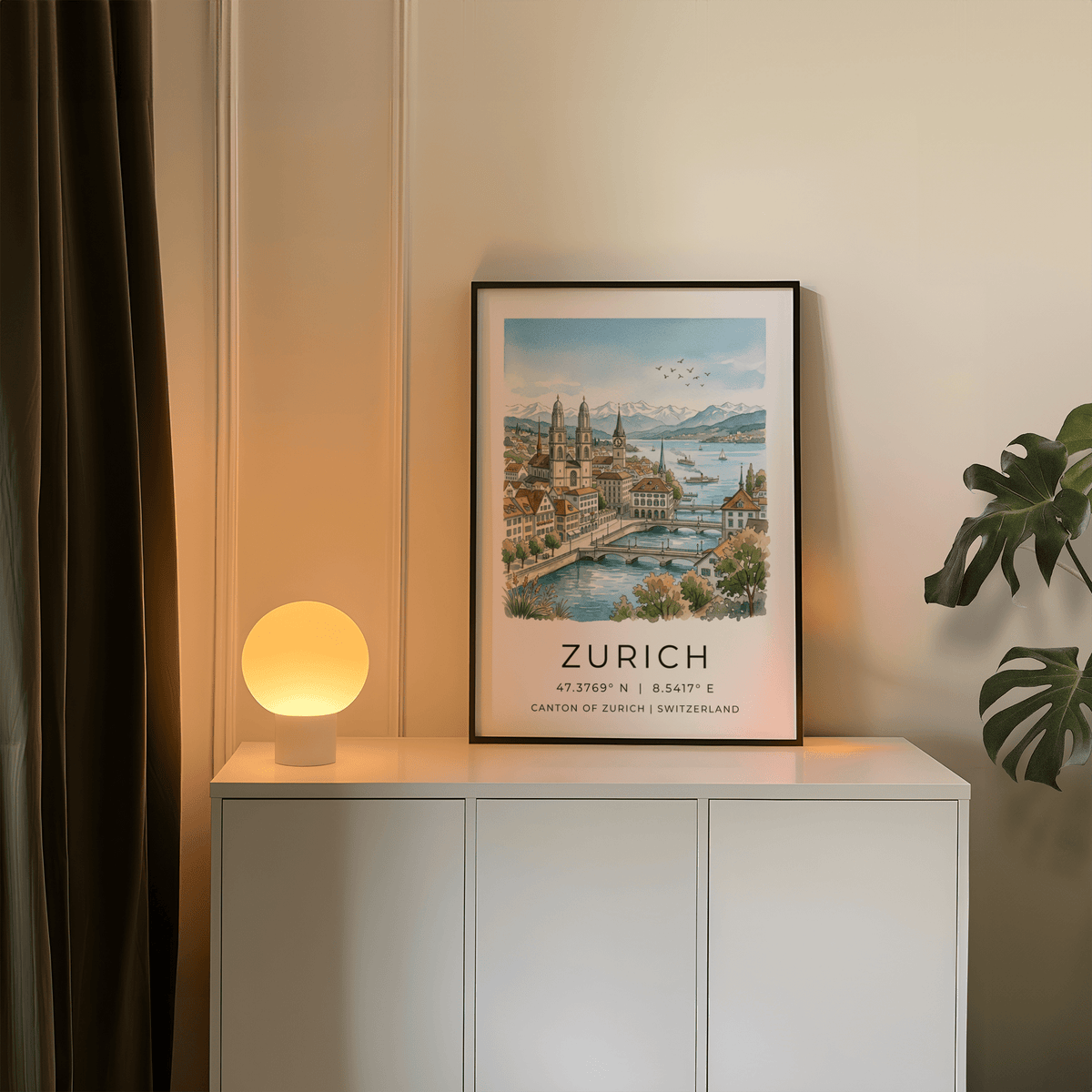 Framed Zurich City Art Print of a watercolour cityscape in soft blue and green tones on a sideboard with lamp