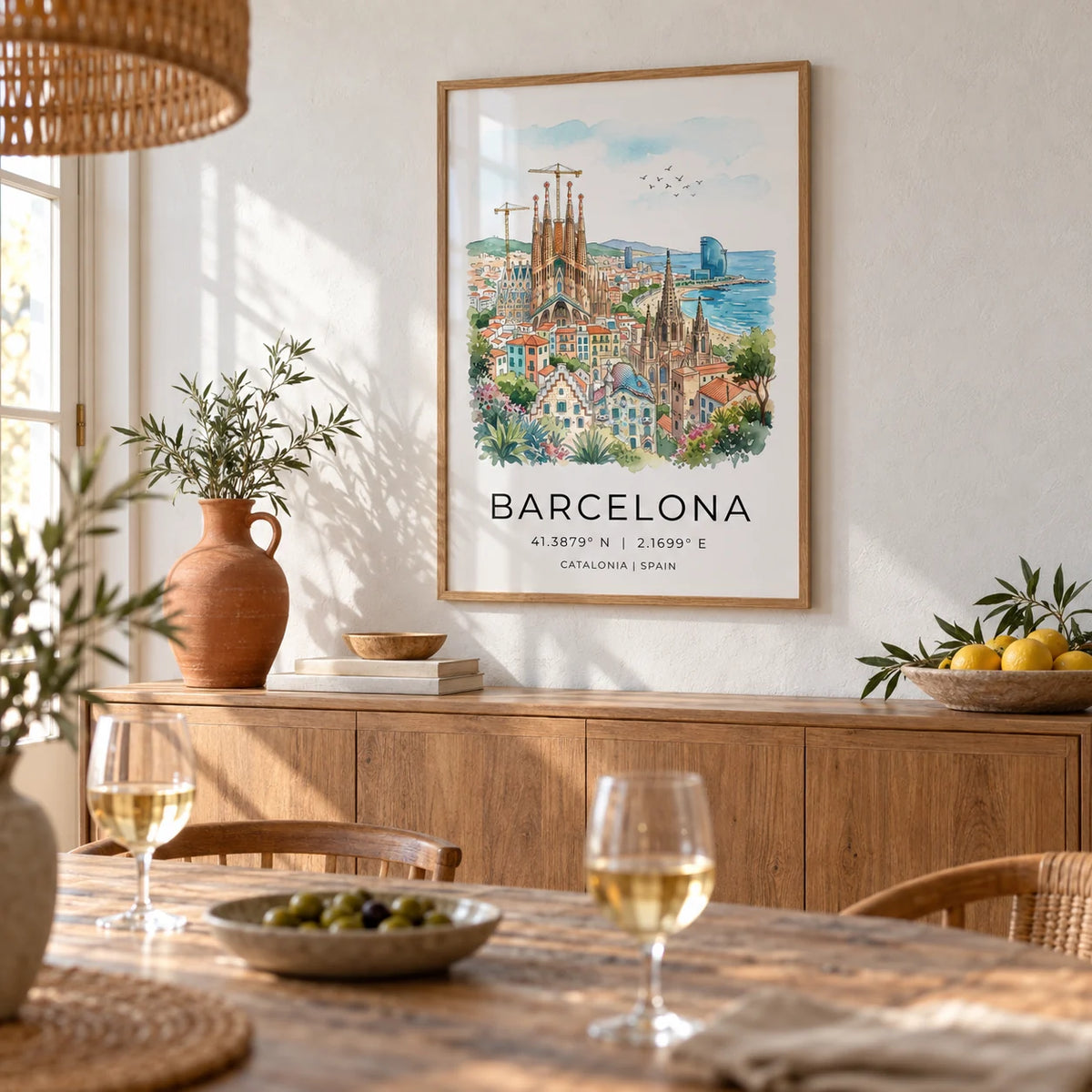 Barcelona Watercolor Poster, framed on the wall of a sunny dining room with whitewashed walls