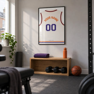 Basketball Jersey Poster in White with Purple Number, framed on the wall of a small converted spare-room home gym in a UK terrace with a light grey wall and plain charcoal rubber flooring