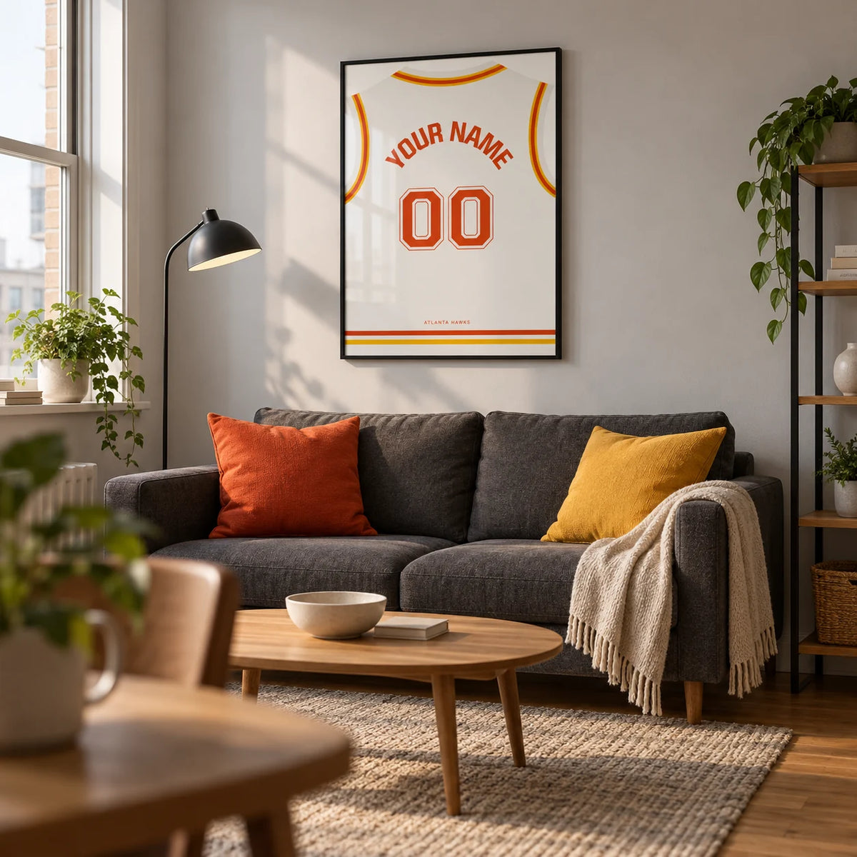 Basketball Jersey Poster in White with Red and Yellow Trim, framed on the wall of a crisp living room in a basketball fan's first UK flat (22-28)
