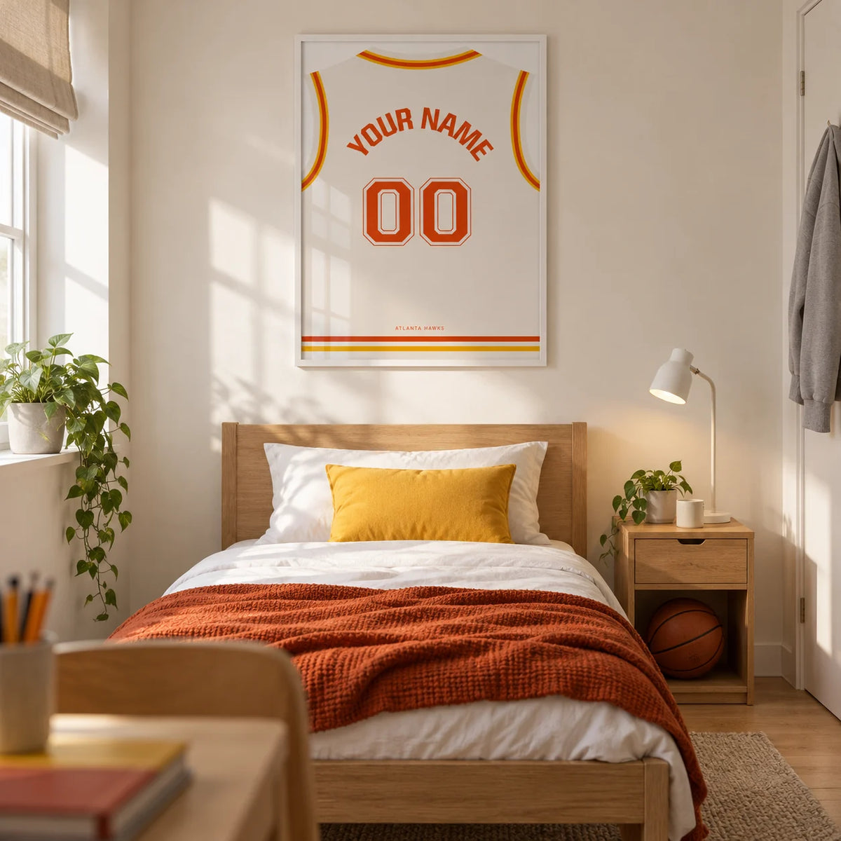 Basketball Jersey Poster in White with Red and Yellow Trim, framed on the wall of a modern basketball-loving teenager's single bedroom (13-17) in a UK family home