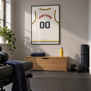 Basketball Jersey Poster in White with Yellow and Navy Trim, framed on the wall of a small home gym in a converted UK spare room with a light grey wall and plain charcoal rubber floor