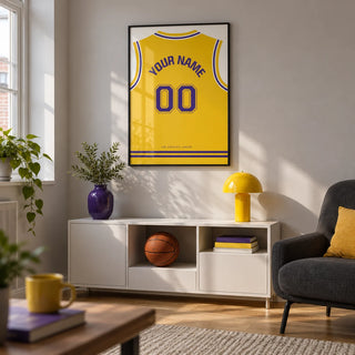 Basketball Jersey Poster in Yellow with Purple Number, framed on the wall of a compact basketball-themed games room in a UK terrace with a pale grey wall and oak floor in a living room