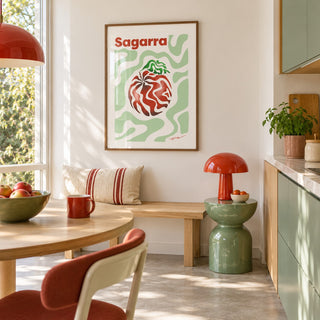Basque Apple Print hung above a breakfast bench in a colourful minimalist kitchen (frame not included)