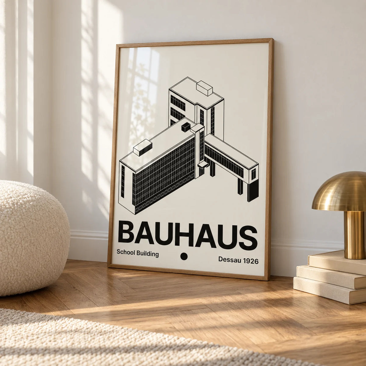 Bauhaus Building Poster, framed on the wall of a calm white room with a white skirting board and herringbone oak parquet
